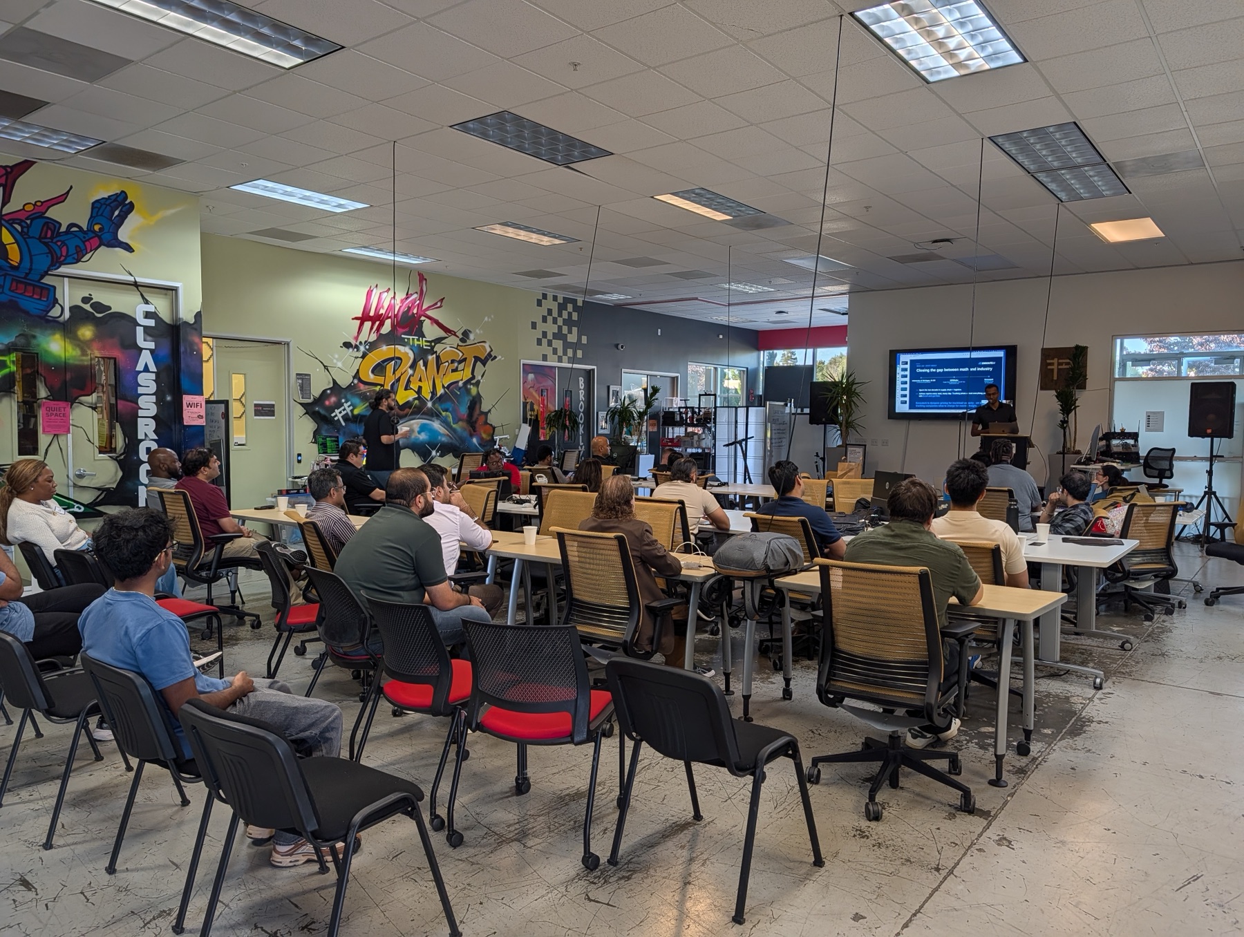 Founders and builders listening to a StartupA2Z presentation at Hacker Dojo