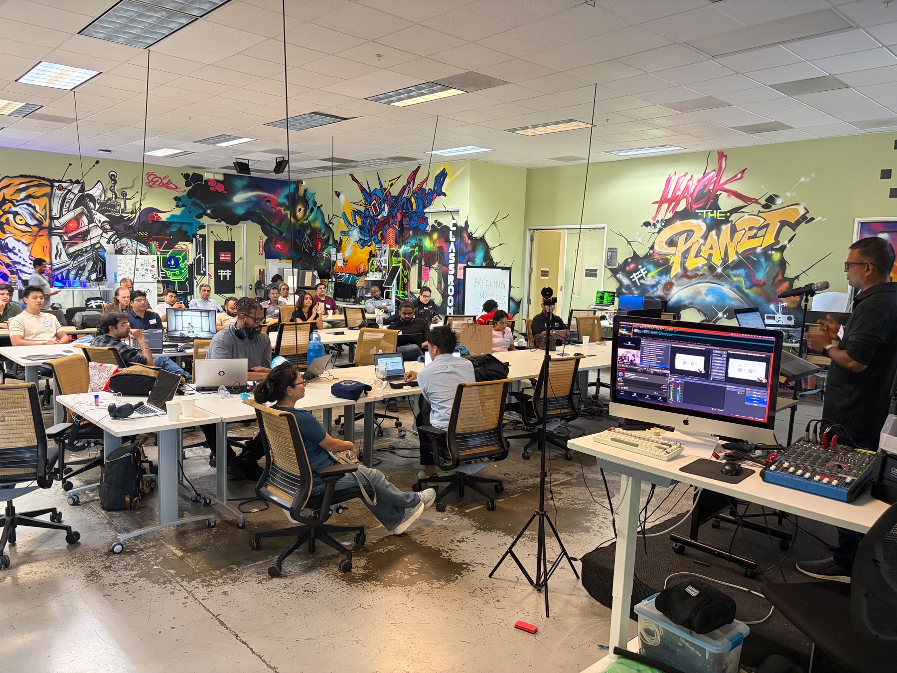 Founders and builders gathered for presentations at Hacker Dojo